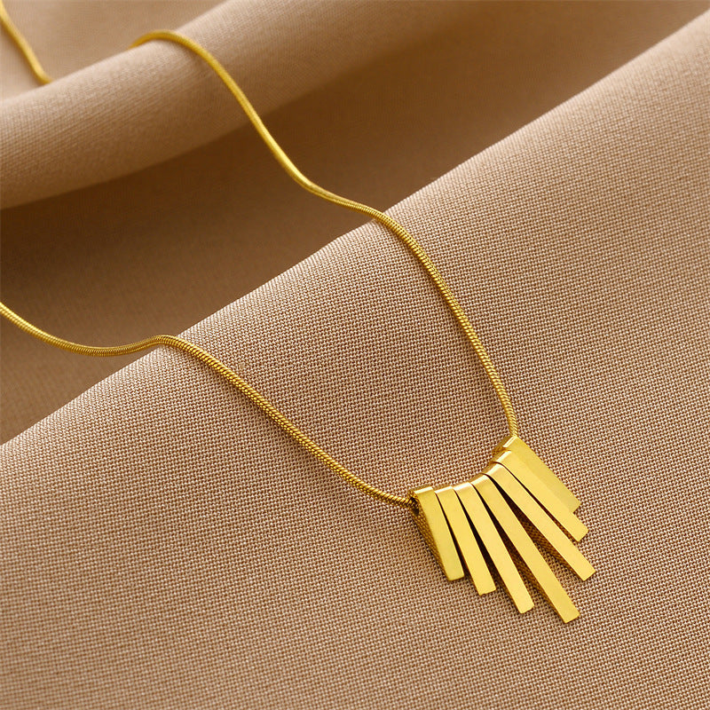 Collier en acier inoxydable avec motif touche de piano