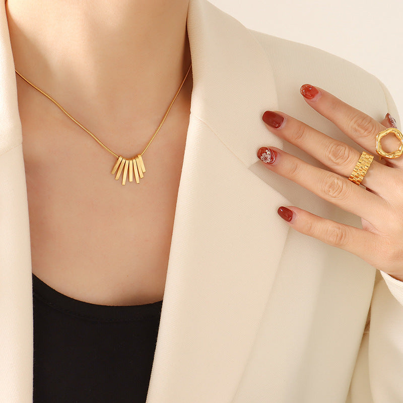 Collier en acier inoxydable avec motif touche de piano