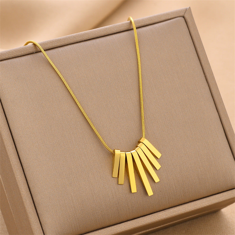 Collier en acier inoxydable avec motif touche de piano