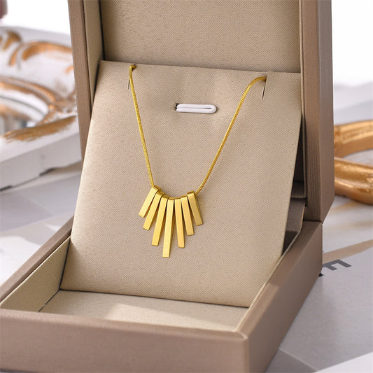Collier en acier inoxydable avec motif touche de piano